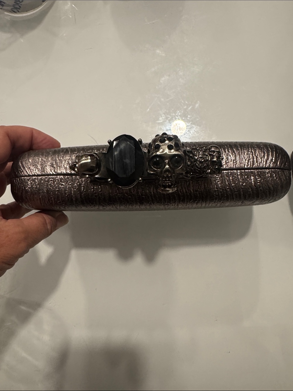 Vintage Metallic Bronze Clutch with Skull and Gem Accent